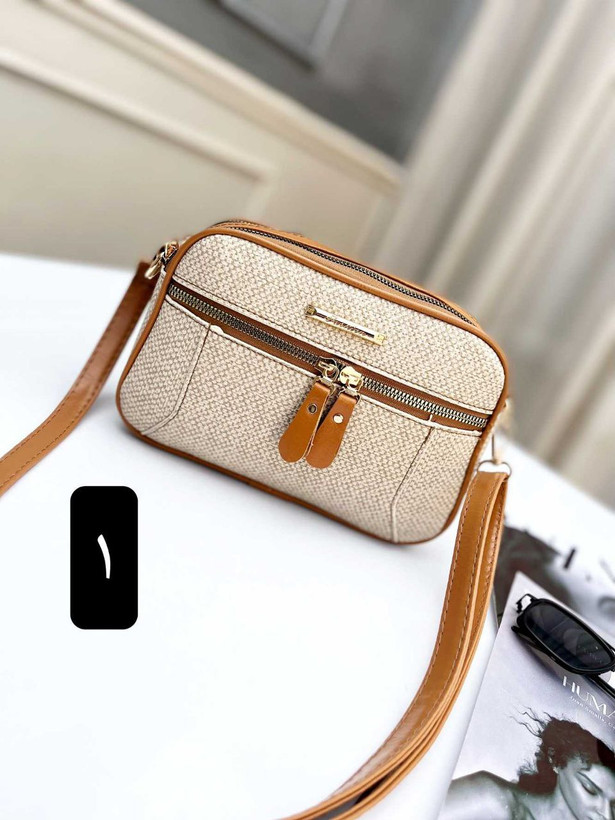 : کیف آیدا ❣جنس : چرم طرح کنف ❣رنگ بندی : نسکافه ای, مشکی, ❣سایز ها : 22*15