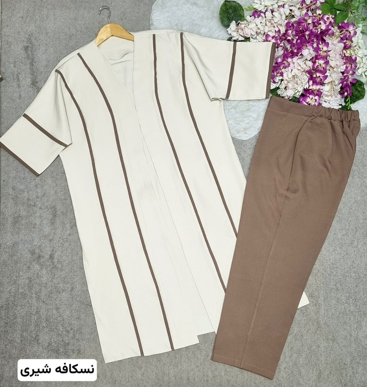 ست مانتو شلوار ستاره جنس: مازراتی درجه1 (کیفیت تضمینی) سایز1 - سایز2 - سایز3 سورمه - مشکی،نسکافه - نسکافه،شیری زنانه