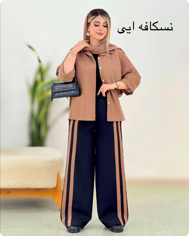 ست دو خط دو تکه (شومیز + شلوار) جنس :شومیز: ینزی پفکی شلوار: بزایاق✅️ آبی - صورتی - قهوه ای - سرمه ای - نسکافه ای - زرد - سایز بندی زنانه
