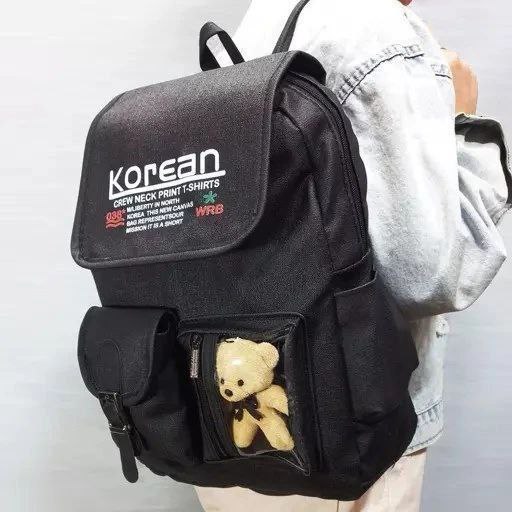 کوله Korean جنس : چرم مشکی رنگ عروسکها رندوم میباشد